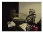 table and 4 chairs for sale. lovely glass table & four....