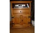 Pine TV/DVD cabinet. Pine television cabinet has a shelf....
